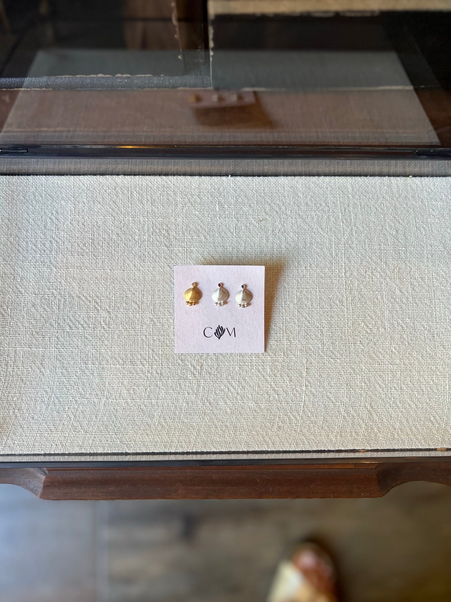 Stud earrings with mini shell nuggets and stones.