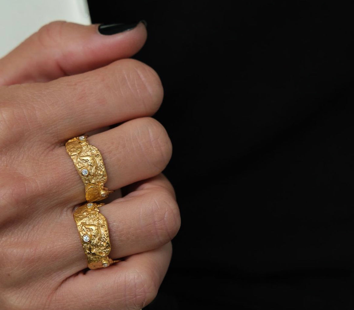 Heart-shaped ring with stones.
