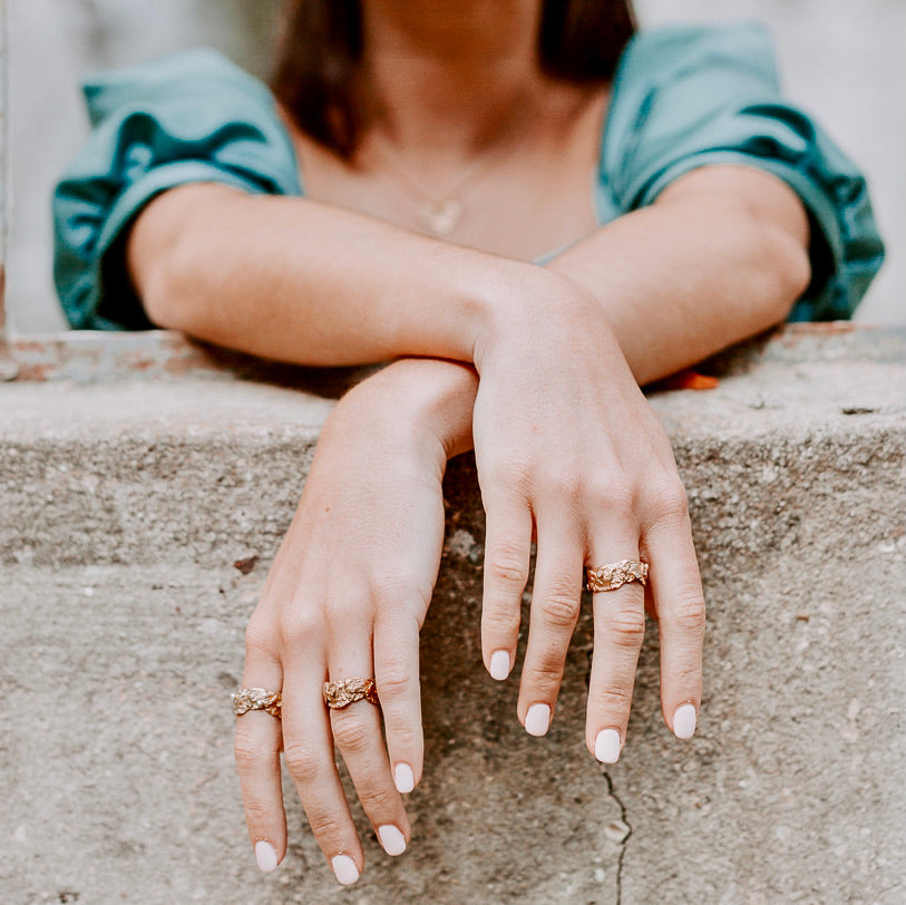 Heart-shaped ring with stones.