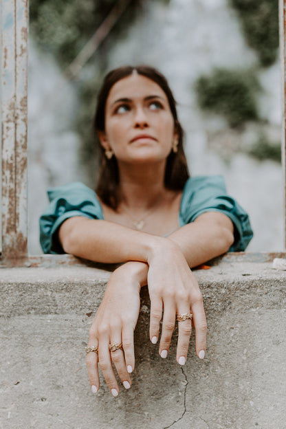 Heart-shaped ring with stones.