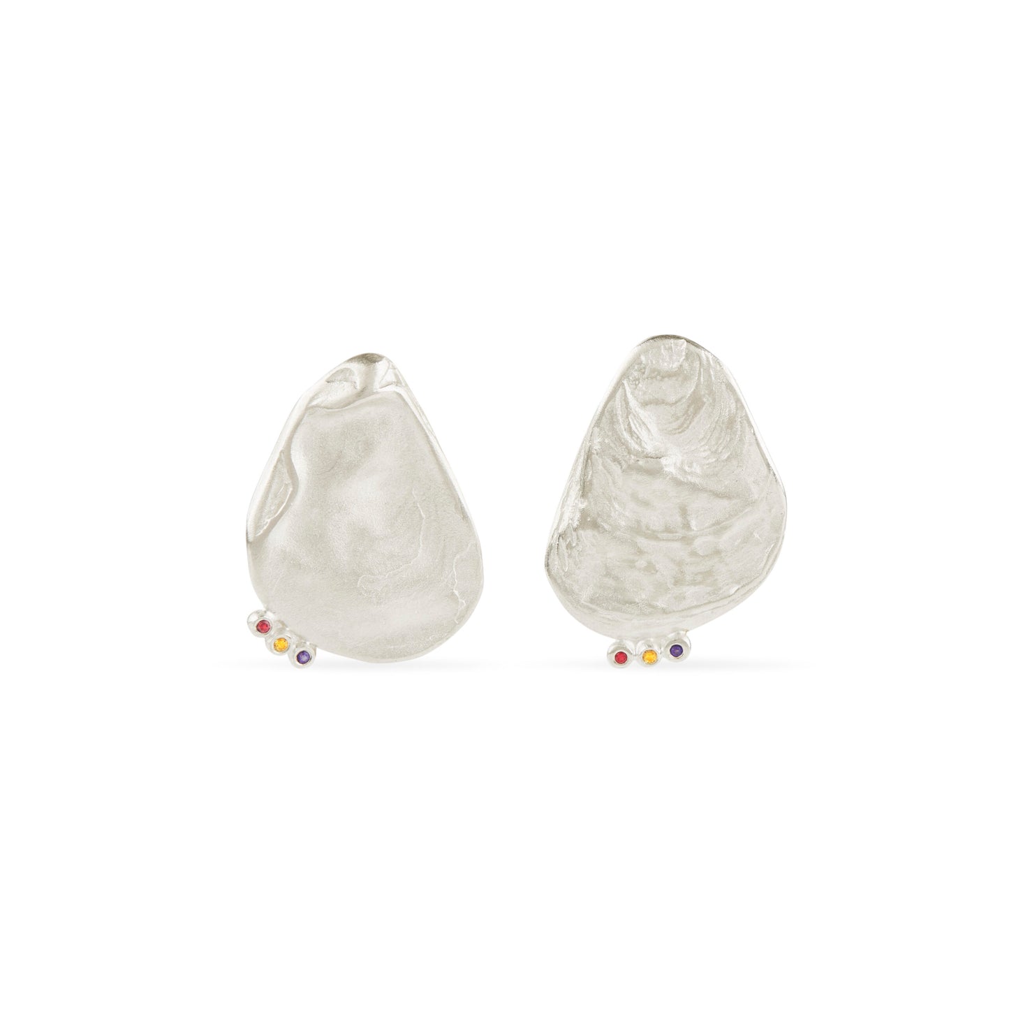 Asymmetrical shell earrings with stones.