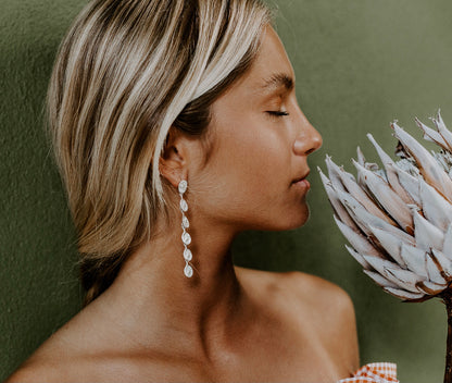 Long articulated earrings Hug