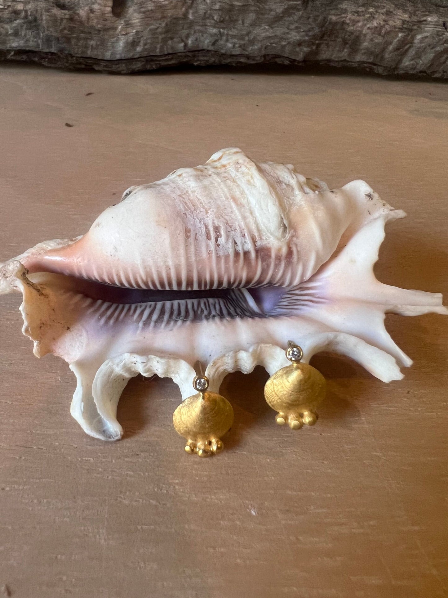 Stud earrings with mini shell nuggets and stones.