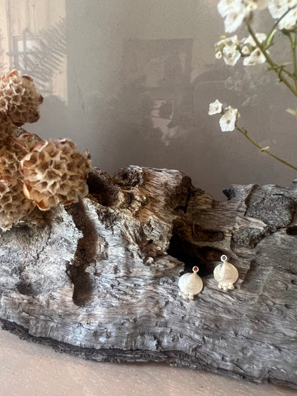 Stud earrings with mini shell nuggets and stones.