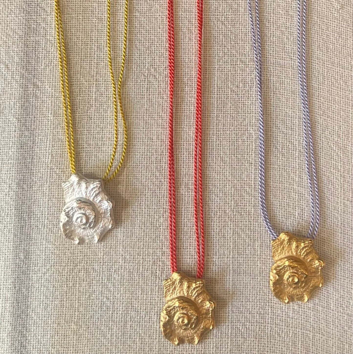 XL cowrie shell pendant with colorful thread