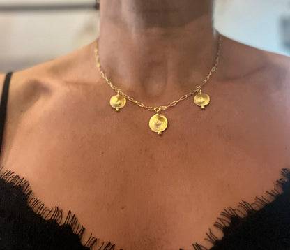 Pendant with 3 shells and nuggets.